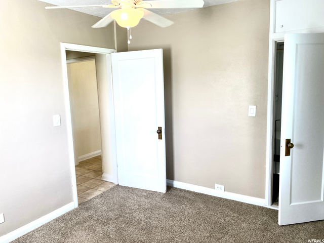 From hallway off bathroom and kitchen.  Closet smaller but room good size for an armoire.