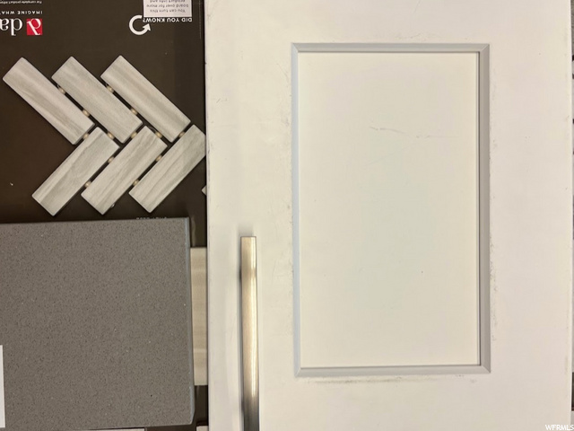 Soft-Close, White Shaker Cabinets. Quartz Color Grey Expo. Tile Backsplash 1x3 Herringbone Grey EL32.Waterproof Laminate Wood Flooring Selection Color: Oat. Grout: Ash #642.