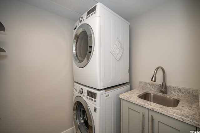 Private laundry room with sink