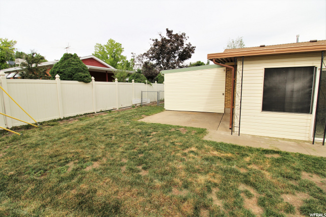 FENCED IN BACK -YARD