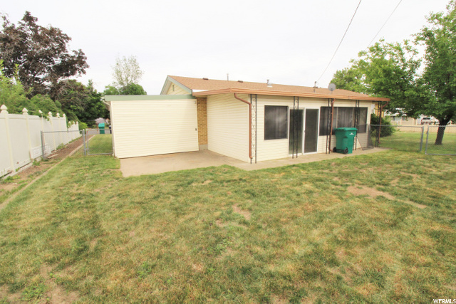 FENCED IN BACK -YARD