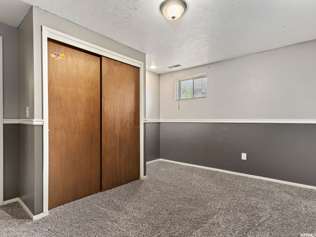 Bedroom With Lighted Desk Area