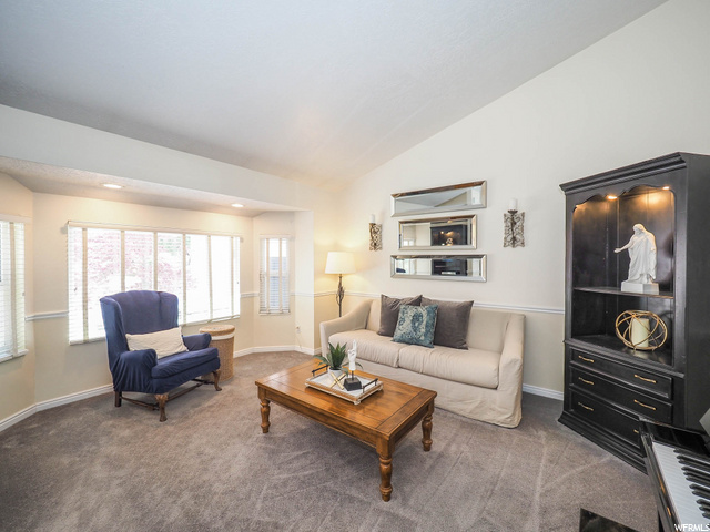 Formal living room w/ bay window