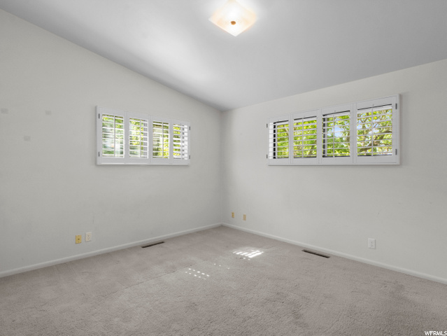 vaulted ceiling in bedroom
