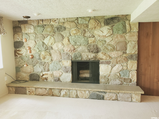 hand chiseled rocks for fireplace down