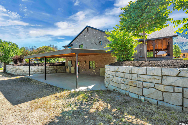 Lower Level Entrance, Patio & Parking