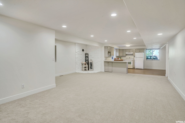 Basement Family Room & Wood Stove Area & Kitchen