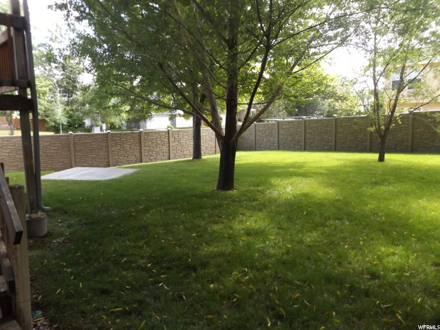 Park like yard with pad for a Hot tub