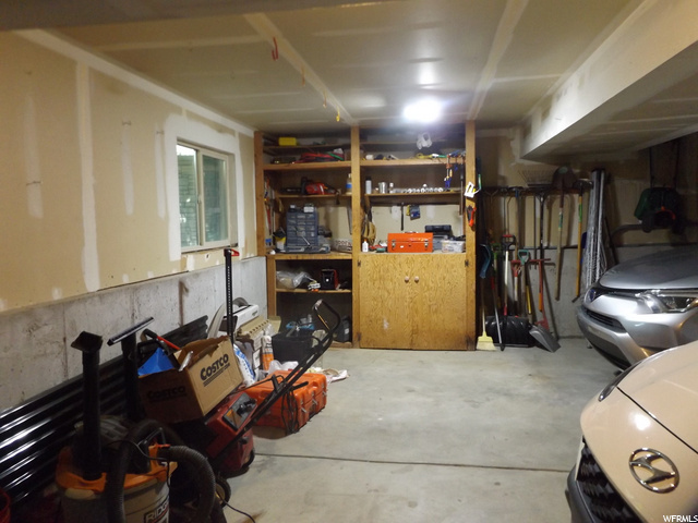 Storage space with work station in garage