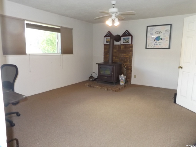 Basement family room with wood burning stove