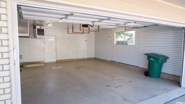 Garage with Heater and Slat wall for Organizing