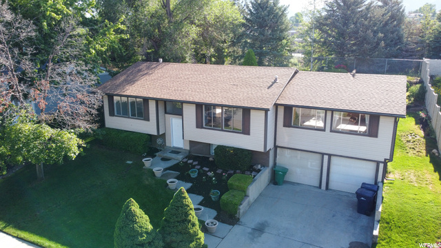 Front of Home showing Open Space with Trees in the