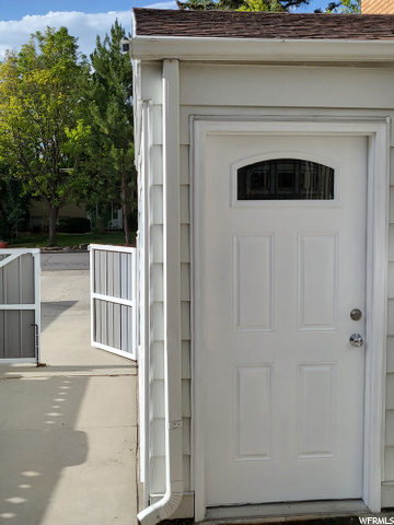 Door into garage and gate