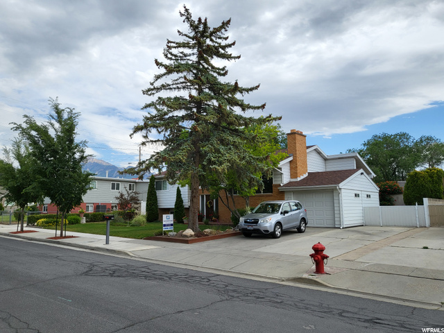 Front view of garage and parking area