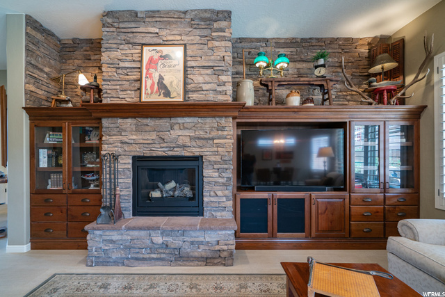 Rock Fireplace & Built-in Entertainment Center