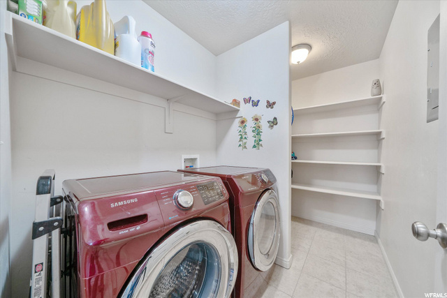 Laundry Room with storage in the back