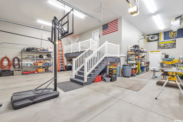 Immaculate heated 4-car garage