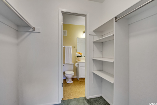 Walk-In Closet and Entrance to Bath