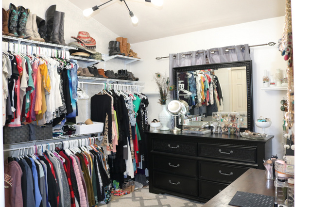 Bedroom being used as extra closet space
