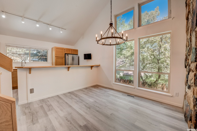 Dining area with large windows for bright and ligh