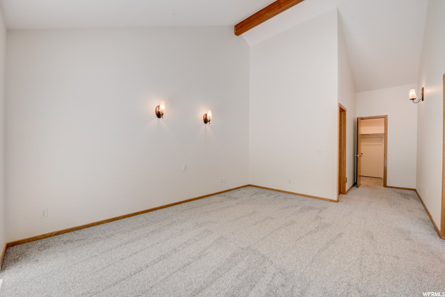 Upper level bedroom #1 with tall ceilings, en-suit