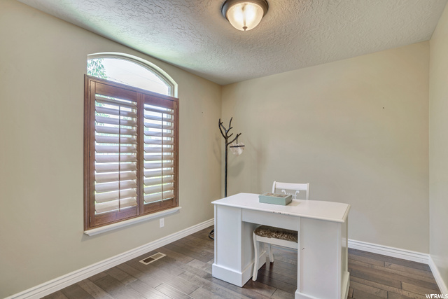 Den off of front entry