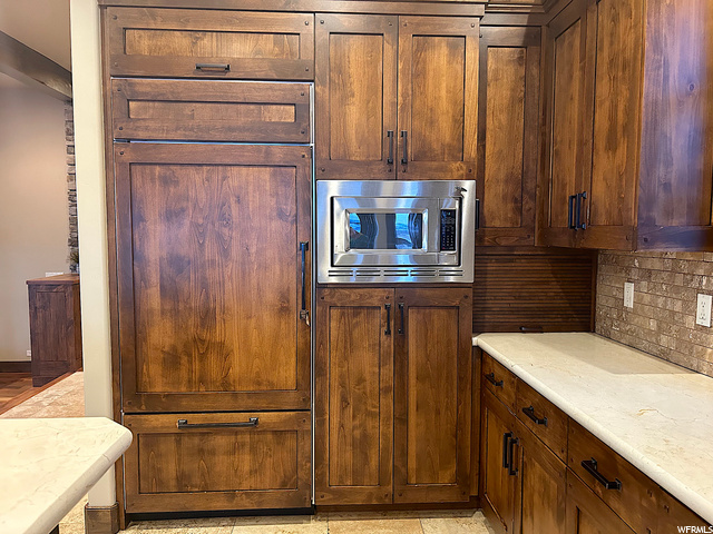 Wood paneled Sub-Zero refrigerator