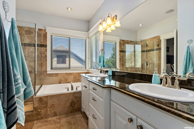 Separate Shower and Tub with His and Her sinks.