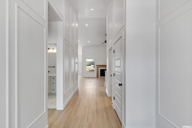 hallway featuring hardwood flooring