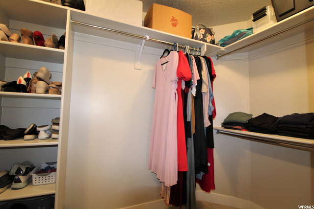 WALK-IN CLOSET IN MASTER BEDROOM