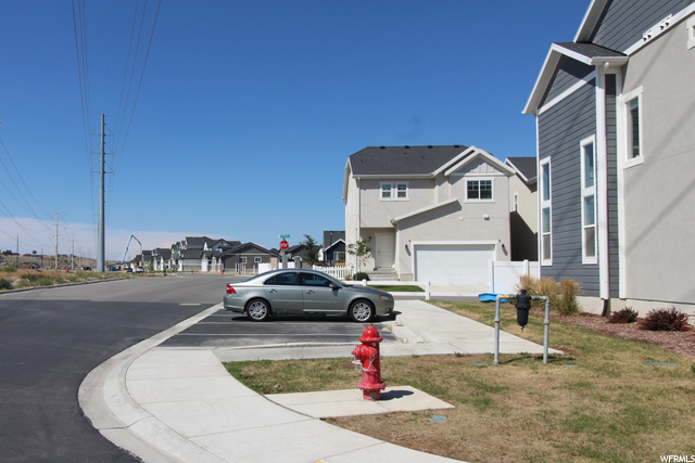SIDE OF HOME / GUEST PARKING