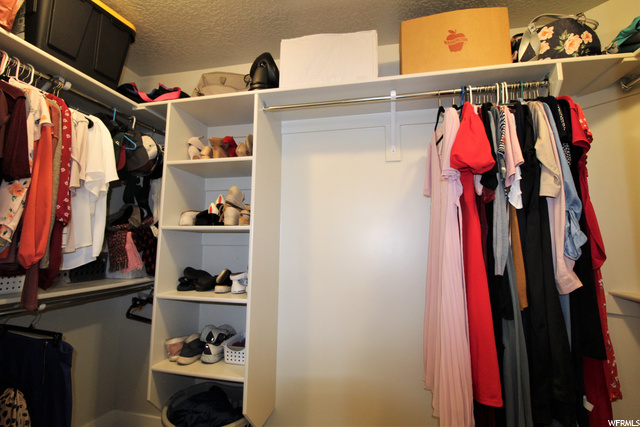 WALK-IN CLOSET IN MASTER BEDROOM