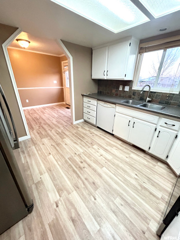 **NEW FLOORING & PAINT, UPDATED CABINETS