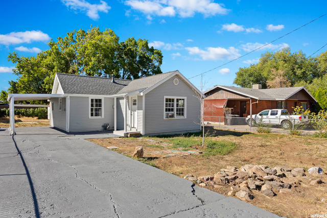 Home - front view w/ carport