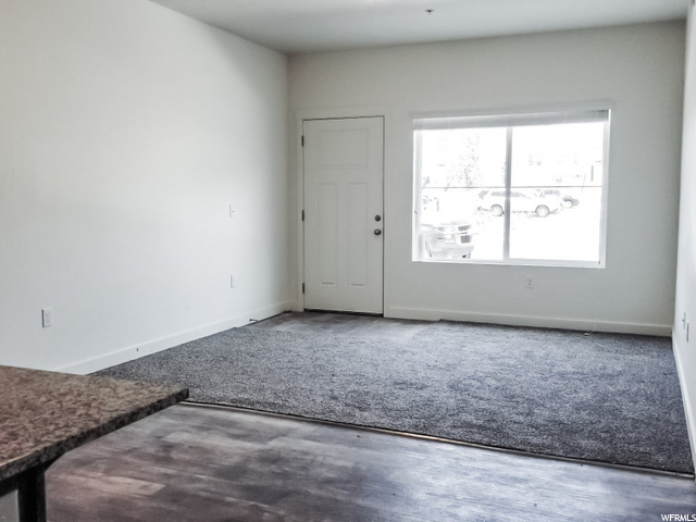 Main Floor Living Room & Walk Out to Patio