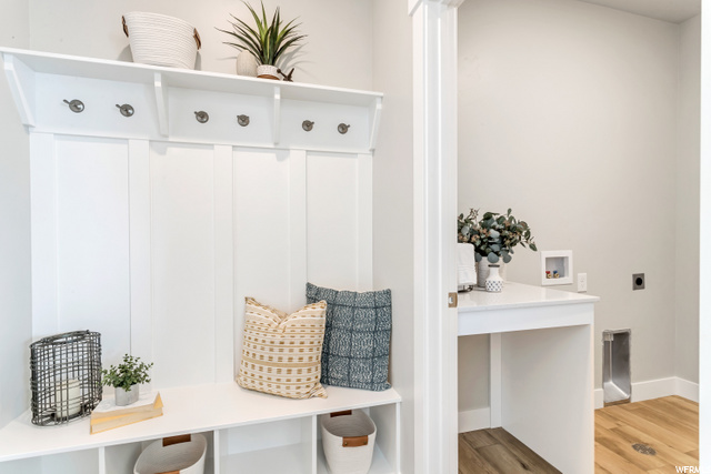mudroom featuring hardwood flooring