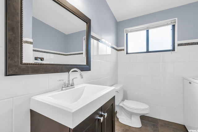 Half Bath and Laundry Main Level