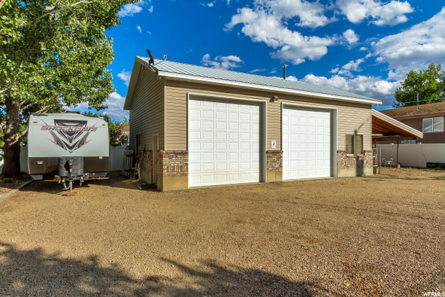 30 FOOT X 60 FOOT GARAGE WITH TWO  14  FOOT GARAGE