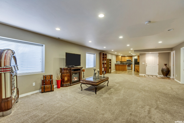 LOWER LEVEL FAMILY ROOM & KITCHEN