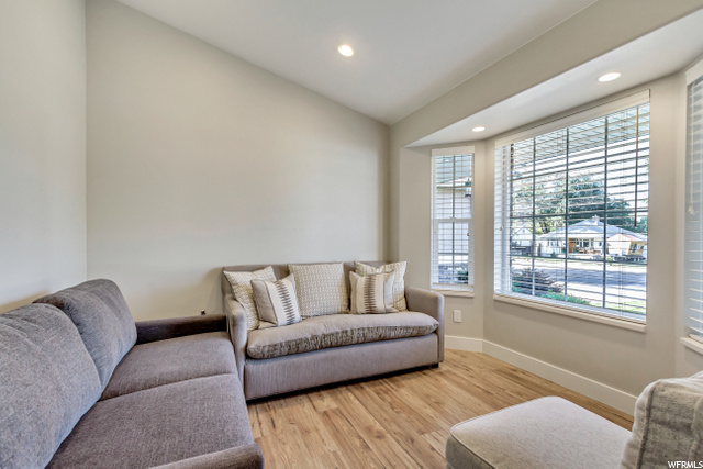 FORMAL LIVING ROOM OR DEN WITH VAULTED CEILING & B