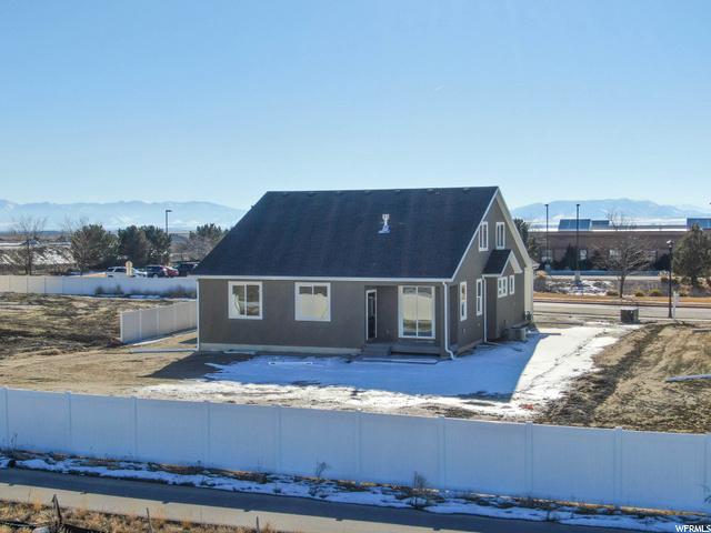 view of front of property with a mountain view