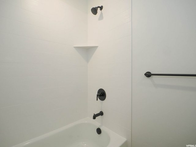 bathroom featuring tub / shower combination
