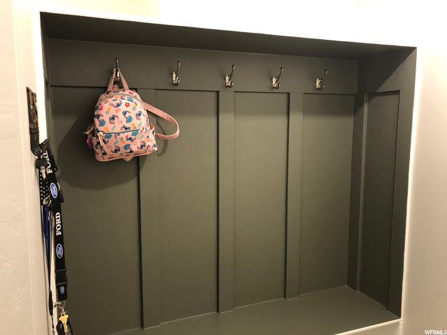 Cubbies & hooks...perfect spot for Backpacks and Shoes and