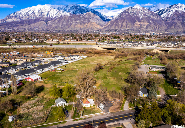 Hello Custom Home Builder's we have a price improvement and just relisted this beautiful acreage that includes a 2 bedroom home on 3 parcels totaling 6.22 acres. Positioned in an amazing location between Orem's University Parkway exit and Provo's Center Street Exit This acreage has incredible views of Provo's infamous "Y" Mountain! The location couldn't be better with newer housing developments sprinkled all around this property's undeveloped acreage. Contact agent for parcel information and awesome drone video footage of the acreage with its amazing views!   Parcels number's are 19:8040026 , 19:0480039 , 19:0480030 (approximately 6.22).