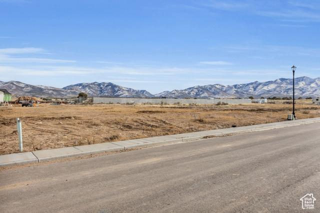 View of mountain feature with a rural view