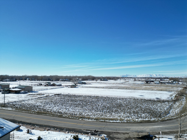 Ogden, Utah Undeveloped acre, partially fenced ready for you to make it your own! 1 water share sold with property. No utilities at this time. Refer to Directions and Map for property location.