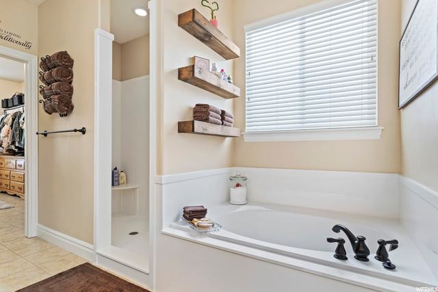 Soaker tub and walk in shower.