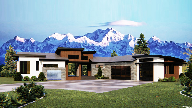 View of front facade featuring a front lawn and a mountain view