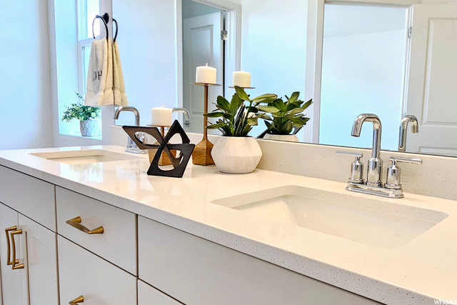 Quarts Counters and Gold Drawer Pulls