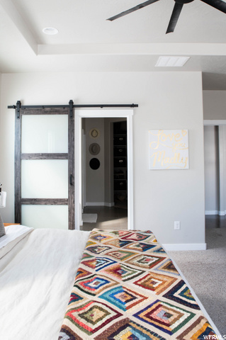 Barn door entrance to bathroom